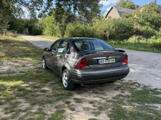 Сірий Форд Фокус, об'ємом двигуна 2 л та пробігом 190 тис. км за 1998 $, фото 4 на Automoto.ua