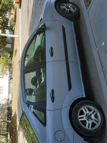 Серый Форд Фокус, объемом двигателя 1.6 л и пробегом 300 тыс. км за 2200 $, фото 3 на Automoto.ua