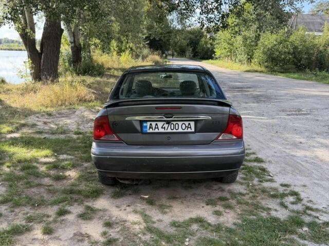 Сірий Форд Фокус, об'ємом двигуна 2 л та пробігом 190 тис. км за 1998 $, фото 5 на Automoto.ua