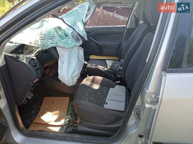 Серый Форд Фокус, объемом двигателя 1.8 л и пробегом 290 тыс. км за 1000 $, фото 2 на Automoto.ua