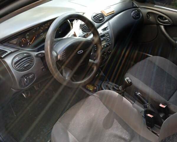 Форд Фокус 2002 в Хмельницком на Automoto.ua Серый Форд Фокус, объемом двигателя 1.8 л и пробегом 198 тыс. км за 2100 $, фото 36 на Automoto.ua