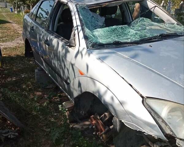 Серый Форд Фокус, объемом двигателя 1.8 л и пробегом 290 тыс. км за 1000 $, фото 8 на Automoto.ua