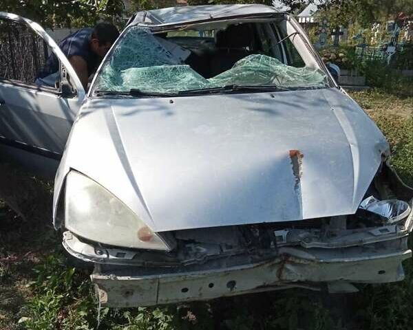 Серый Форд Фокус, объемом двигателя 1.8 л и пробегом 290 тыс. км за 1000 $, фото 10 на Automoto.ua