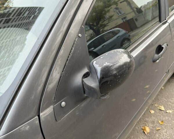 Сірий Форд Фокус, об'ємом двигуна 2 л та пробігом 190 тис. км за 2750 $, фото 8 на Automoto.ua