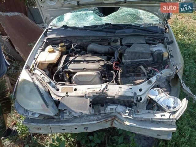 Серый Форд Фокус, объемом двигателя 1.8 л и пробегом 290 тыс. км за 1000 $, фото 5 на Automoto.ua