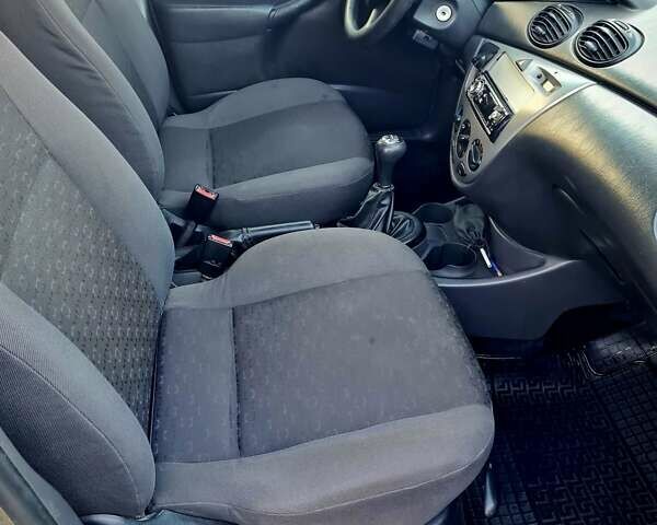 Серый Форд Фокус, объемом двигателя 1.6 л и пробегом 381 тыс. км за 3799 $, фото 13 на Automoto.ua