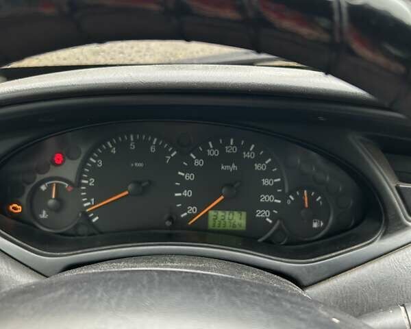 Серый Форд Фокус, объемом двигателя 1.4 л и пробегом 333 тыс. км за 3000 $, фото 7 на Automoto.ua