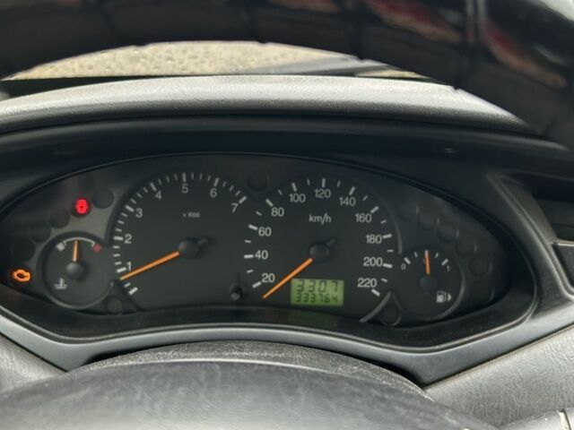 Серый Форд Фокус, объемом двигателя 1.4 л и пробегом 335 тыс. км за 2500 $, фото 6 на Automoto.ua