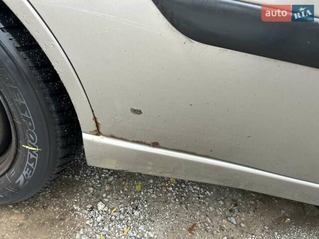 Серый Форд Фокус, объемом двигателя 1.4 л и пробегом 333 тыс. км за 3000 $, фото 4 на Automoto.ua
