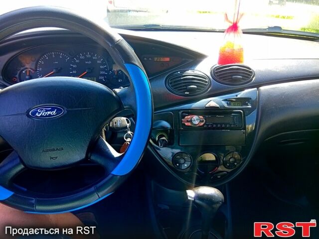 Серый Форд Фокус, объемом двигателя 1.6 л и пробегом 239 тыс. км за 3800 $, фото 4 на Automoto.ua