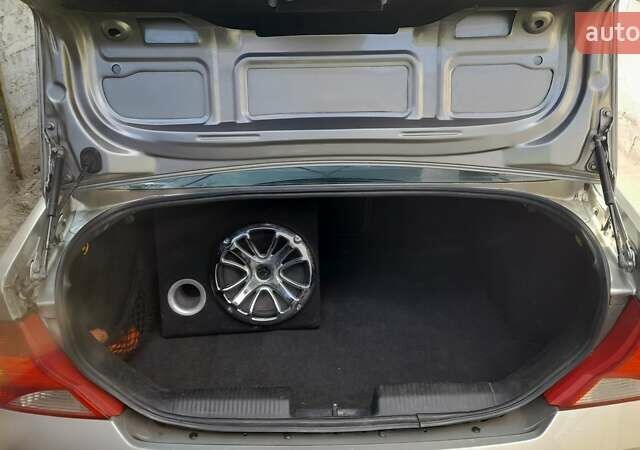 Серый Форд Фокус, объемом двигателя 1.6 л и пробегом 290 тыс. км за 3100 $, фото 6 на Automoto.ua