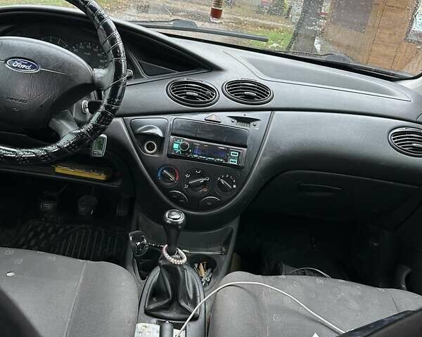 Серый Форд Фокус, объемом двигателя 1.4 л и пробегом 333 тыс. км за 3000 $, фото 5 на Automoto.ua