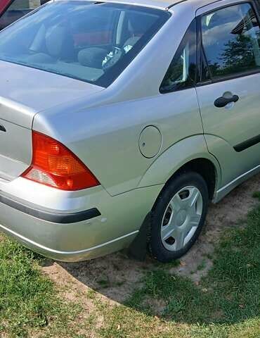 Серый Форд Фокус, объемом двигателя 1.6 л и пробегом 150 тыс. км за 3650 $, фото 7 на Automoto.ua