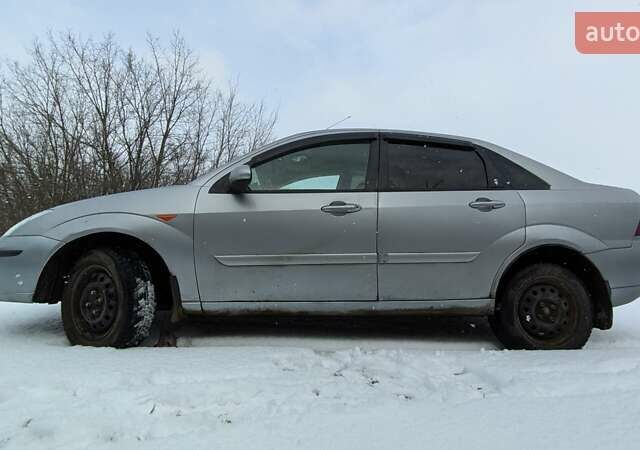 Серый Форд Фокус, объемом двигателя 1.8 л и пробегом 232 тыс. км за 3200 $, фото 3 на Automoto.ua