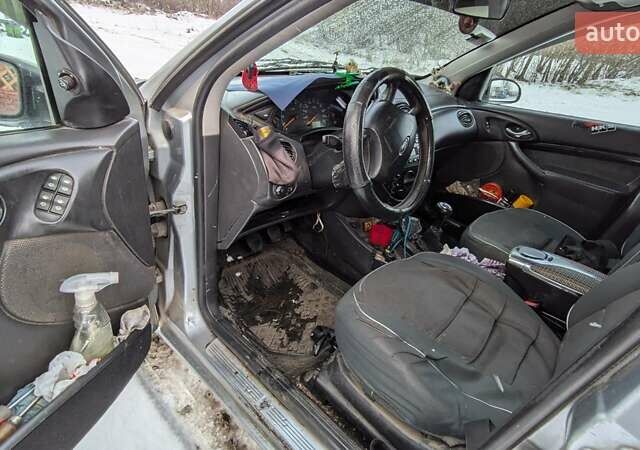 Серый Форд Фокус, объемом двигателя 1.8 л и пробегом 232 тыс. км за 3200 $, фото 7 на Automoto.ua