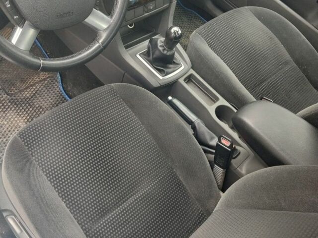 Сірий Форд Фокус, об'ємом двигуна 1.8 л та пробігом 246 тис. км за 4600 $, фото 2 на Automoto.ua