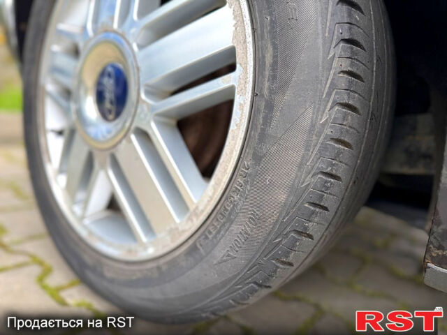 Серый Форд Фокус, объемом двигателя 1.6 л и пробегом 179 тыс. км за 3700 $, фото 6 на Automoto.ua