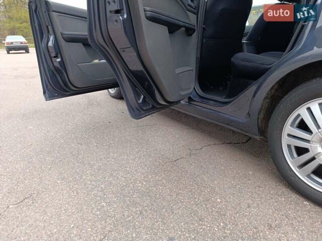 Серый Форд Фокус, объемом двигателя 1.8 л и пробегом 218 тыс. км за 5250 $, фото 11 на Automoto.ua
