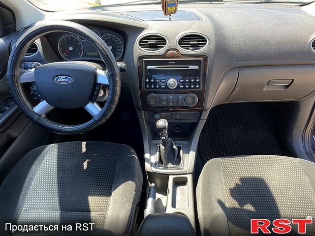 Серый Форд Фокус, объемом двигателя 1.6 л и пробегом 236 тыс. км за 3750 $, фото 9 на Automoto.ua