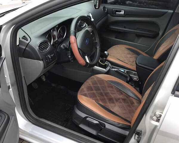 Серый Форд Фокус, объемом двигателя 1.6 л и пробегом 142 тыс. км за 5800 $, фото 8 на Automoto.ua