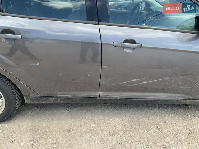 Серый Форд Фокус, объемом двигателя 2 л и пробегом 209 тыс. км за 6250 $, фото 9 на Automoto.ua