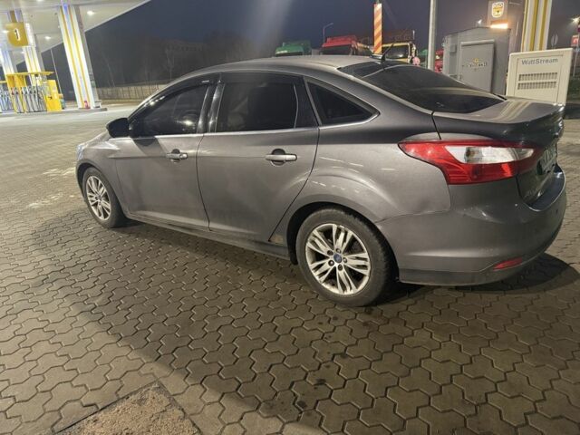 Серый Форд Фокус, объемом двигателя 2 л и пробегом 225 тыс. км за 6150 $, фото 2 на Automoto.ua