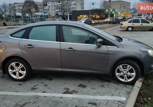 Серый Форд Фокус, объемом двигателя 1.6 л и пробегом 235 тыс. км за 7200 $, фото 9 на Automoto.ua