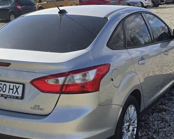Сірий Форд Фокус, об'ємом двигуна 2 л та пробігом 218 тис. км за 6600 $, фото 9 на Automoto.ua