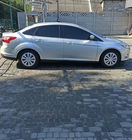 Сірий Форд Фокус, об'ємом двигуна 2 л та пробігом 241 тис. км за 6650 $, фото 20 на Automoto.ua
