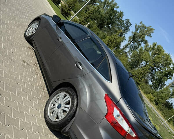 Сірий Форд Фокус, об'ємом двигуна 2 л та пробігом 230 тис. км за 7300 $, фото 6 на Automoto.ua