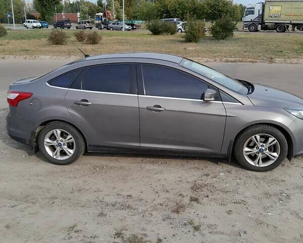 Серый Форд Фокус, объемом двигателя 1.6 л и пробегом 148 тыс. км за 7700 $, фото 6 на Automoto.ua