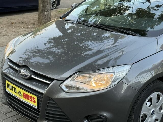 Сірий Форд Фокус, об'ємом двигуна 2 л та пробігом 135 тис. км за 7499 $, фото 8 на Automoto.ua