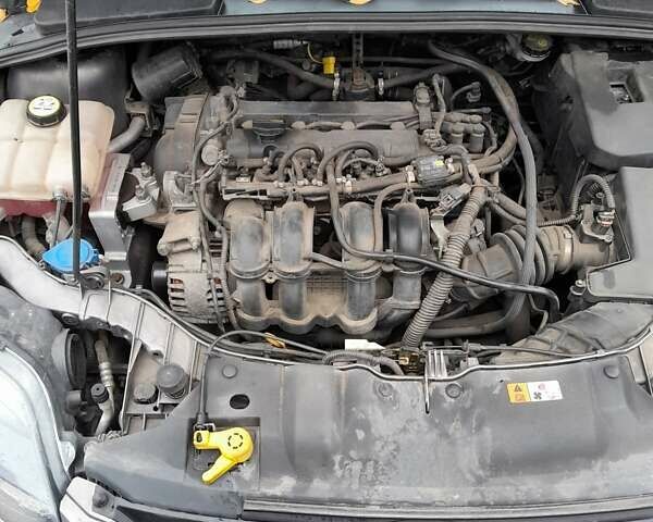 Серый Форд Фокус, объемом двигателя 1.6 л и пробегом 148 тыс. км за 7700 $, фото 14 на Automoto.ua