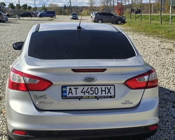 Сірий Форд Фокус, об'ємом двигуна 2 л та пробігом 218 тис. км за 6600 $, фото 4 на Automoto.ua