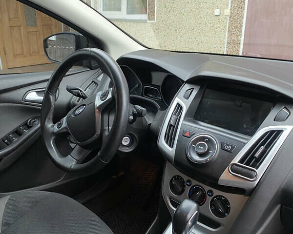 Сірий Форд Фокус, об'ємом двигуна 2 л та пробігом 240 тис. км за 6700 $, фото 4 на Automoto.ua