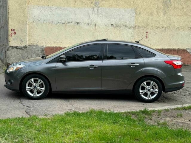 Сірий Форд Фокус, об'ємом двигуна 2 л та пробігом 239 тис. км за 6990 $, фото 7 на Automoto.ua