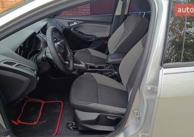 Форд Фокус 2013 в Николаеве на Automoto.ua Серый Форд Фокус, объемом двигателя 2 л и пробегом 198 тыс. км за 7499 $, фото 14 на Automoto.ua