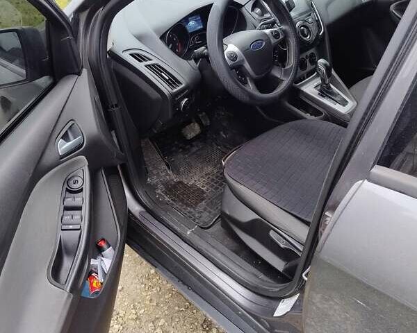 Сірий Форд Фокус, об'ємом двигуна 2 л та пробігом 272 тис. км за 6600 $, фото 4 на Automoto.ua