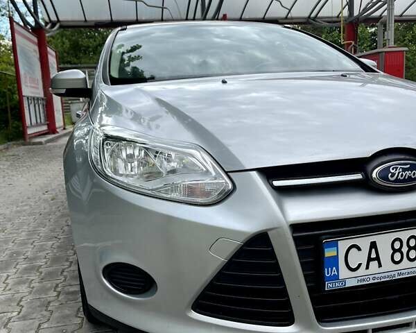 Сірий Форд Фокус, об'ємом двигуна 1 л та пробігом 119 тис. км за 7000 $, фото 10 на Automoto.ua
