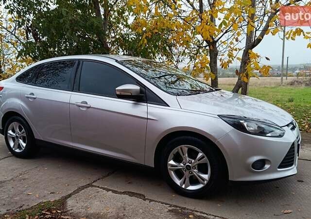 Форд Фокус 2013 в Николаеве на Automoto.ua Серый Форд Фокус, объемом двигателя 2 л и пробегом 198 тыс. км за 7499 $, фото 11 на Automoto.ua