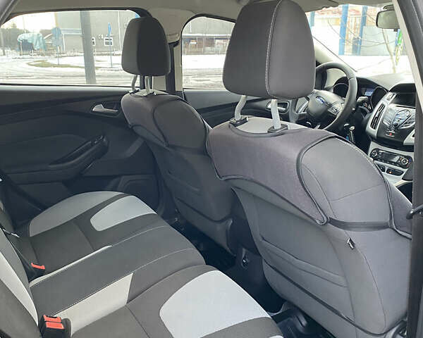 Серый Форд Фокус, объемом двигателя 1 л и пробегом 166 тыс. км за 5999 $, фото 24 на Automoto.ua