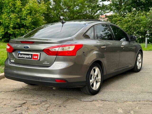 Сірий Форд Фокус, об'ємом двигуна 2 л та пробігом 239 тис. км за 6990 $, фото 4 на Automoto.ua