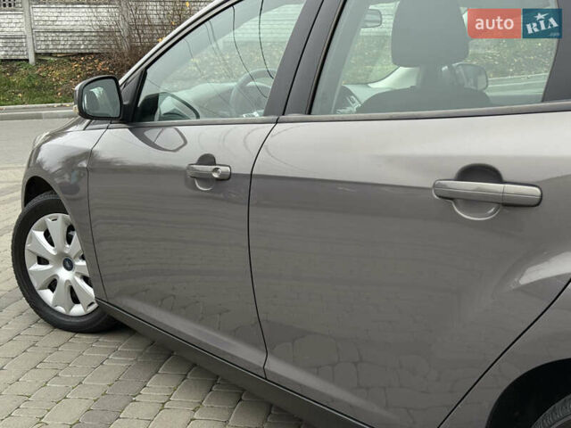 Серый Форд Фокус, объемом двигателя 1 л и пробегом 145 тыс. км за 6350 $, фото 24 на Automoto.ua