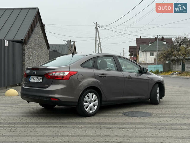 Серый Форд Фокус, объемом двигателя 1 л и пробегом 145 тыс. км за 6350 $, фото 1 на Automoto.ua