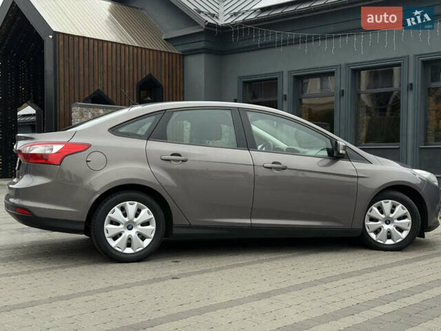 Серый Форд Фокус, объемом двигателя 1 л и пробегом 145 тыс. км за 6350 $, фото 6 на Automoto.ua
