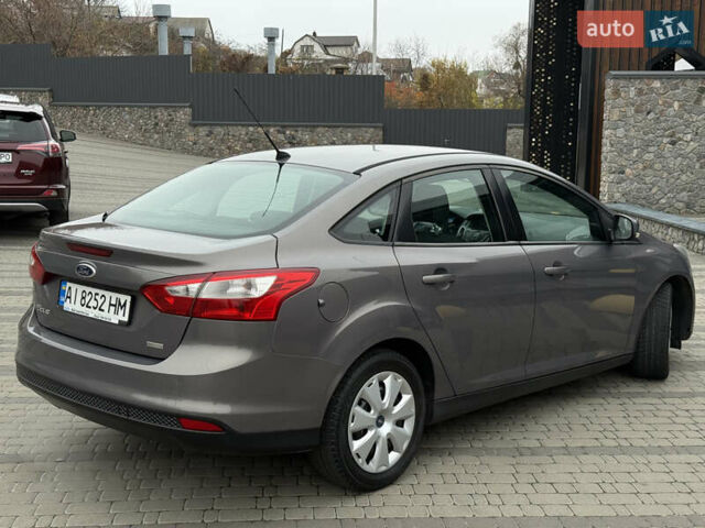 Серый Форд Фокус, объемом двигателя 1 л и пробегом 145 тыс. км за 6350 $, фото 27 на Automoto.ua