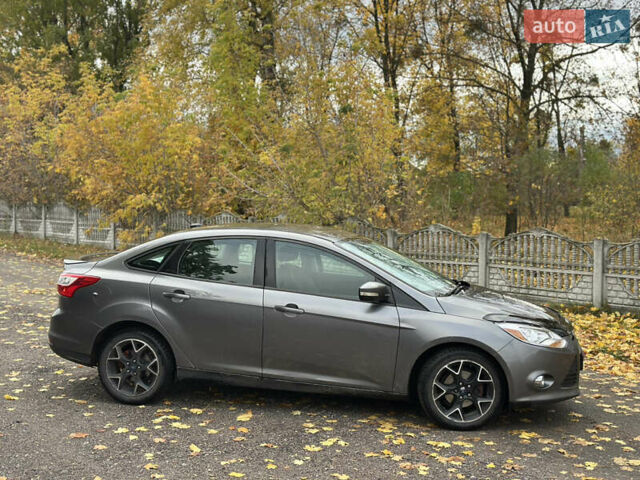 Форд Фокус 2014 в Белой Церкве на Automoto.ua Серый Форд Фокус, объемом двигателя 2 л и пробегом 151 тыс. км за 5999 $, фото 12 на Automoto.ua