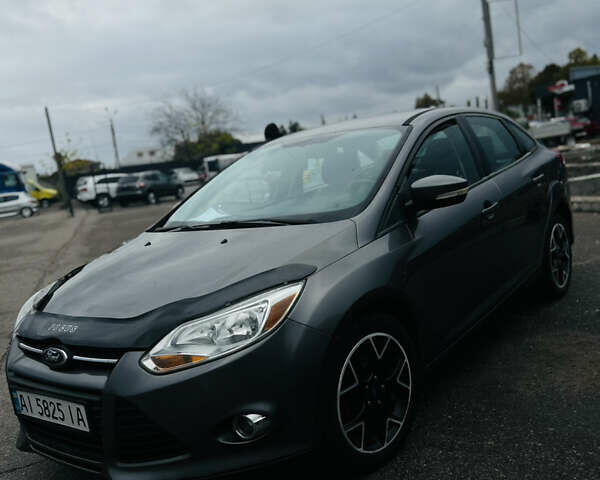 Форд Фокус 2014 в Белой Церкве на Automoto.ua Серый Форд Фокус, объемом двигателя 2 л и пробегом 151 тыс. км за 5999 $, фото 17 на Automoto.ua