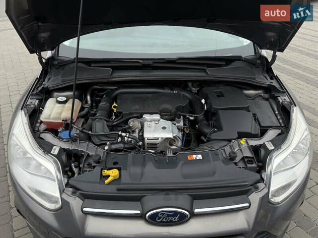 Серый Форд Фокус, объемом двигателя 1 л и пробегом 145 тыс. км за 6350 $, фото 31 на Automoto.ua