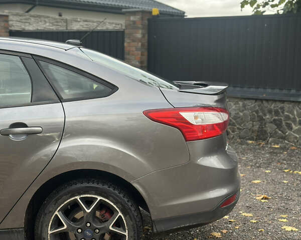 Форд Фокус 2014 в Белой Церкве на Automoto.ua Серый Форд Фокус, объемом двигателя 2 л и пробегом 151 тыс. км за 5999 $, фото 9 на Automoto.ua